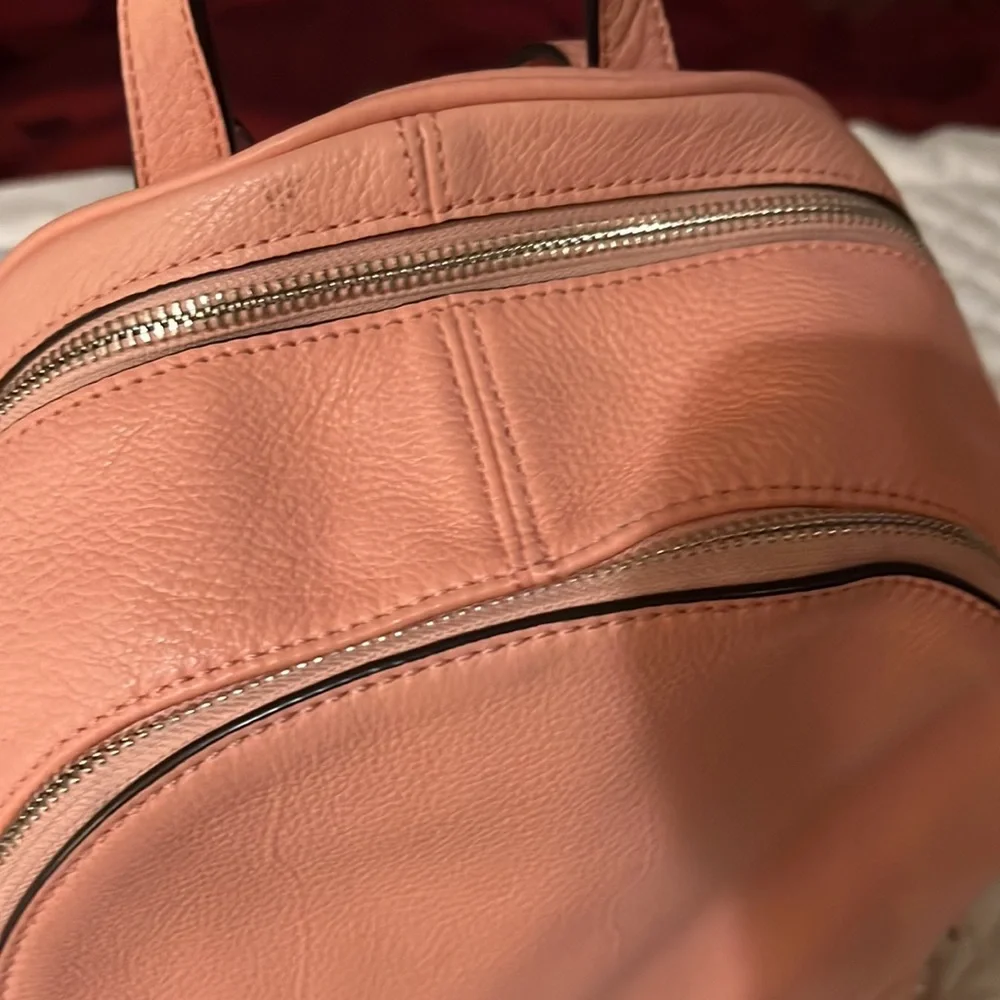 Michael Kors Rhea Medium Silver-Ringed Backpack with Fur Pompom in Coral…